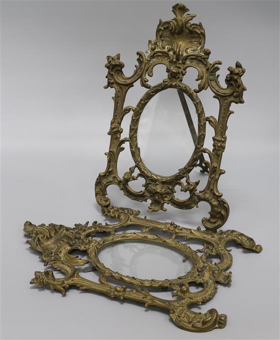 A pair of rococco-style ormolu easel picture frames, height 34cm